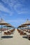 Deck chairs and umbrellas on a sandy beach