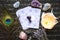 Deck with divination homemade Angel cards on black table, surrounded with semi precious stones crystals.