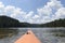 Deck of kayak and horizon of alpine lake