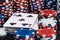 Deck of playing cards surrounded by stacks of poker chips background