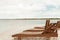 Deckchair lounger on the edge of the beach in summer with nice tropical weather