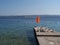 Deckchair and parasol on the pier