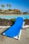 Deckchair standing by the tropical pool