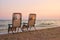 Deckchairs with attached sun hats.