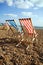 Deckchairs beach sea windy