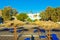 Deckchairs on empty Kamari Black beach Santorini Greece