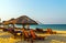 Deckchairs and parasol tropical beach sea landscape, romantic paradise