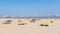 Deckchairs and parasols on a beach