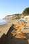 Deckchairs on the promenade overlooking Shanklin beach