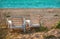 deckchairs on a sandy beach