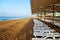 Deckchairs stand in a row on the beach, without people, early morning, concept trip, vacation