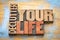 Declutter your life word abstract in wood type