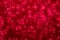 Decompressed abstract red glitter background