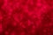 Decompressed abstract red glitter background