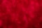 Decompressed abstract red glitter background