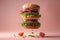 Deconstructed hamburger layers floating on soft pastel background with copy space