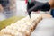 Decor of cakes with chocolate and nuts, close-up of serving sweets in restaurant in kitchen