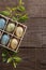 Decor Easter eggs over rustic wooden background with copyspace