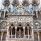 Decor of facade of Duomo Cathedral in Ferrara