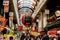 Decorate big red Japanese paper lantern hanging on the entrance at Kuromon Ichiba fresh market