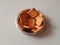 Decorate biscuits in steel bowl.