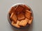 Decorate biscuits in steel bowl.