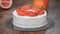 Decorate grapefruit cake with mint leaves