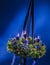 Decorated advent wreath on blue background