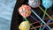Decorated ball-shaped sweets on sticks.