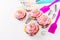 Decorated birthday cupcakes and cookware background