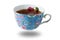 Decorated blue porcelain teacup full of tea levitating