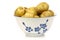 Decorated bowl with fresh potatoes