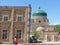 Decorated bricks building with behind an ancient mosque to  Khiva in Uzbekistan.