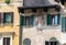 Decorated buildings overlooking Piazza delle Erbe, Verona, Italy