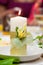 Decorated candle on the wedding table, ritual of lighting the hearth