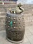 Decorated cast metal trash bin