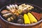 Decorated catering banquet table with different asian sushi rolls and nigiri sushi plate assortment on a party