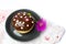 Decorated chocolate donuts with purple flower