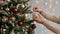 Decorated christmas tree, copy space over festive lights background