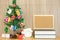 decorated christmas tree cork board & book. xmas new year holiday festival.