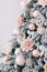 Decorated Christmas tree in rustic and shabby chic style. New Year scene. Close-up. Christmas tree and christmas