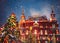 Decorated Christmas trees in honor of the Shrovetide week in Moscow near the Red Square. On the building written text Historical M