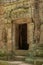 Decorated doorway and bas-reliefs at ruined temple