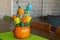 Decorated Easter eggs with the catkins on table.