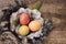 Decorated easter eggs with wood, moss, natural style in spring