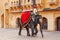 Decorated elephant walking in Jaleb Chowk main courtyard in Am