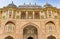 Decorated facade of the Ganesh Pol building at the Amer Fort in Jaipur