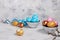 Decorated golden and blue easter eggs on concrete background. Minimal holiday concept. Happy easter background. Creative painting