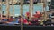 Decorated gondolas parked at Grand Canal, traditional water transport in Venice