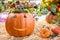 Decorated Halloween pumpkin on the table in the greek garden shop - Halloween celebration preparation